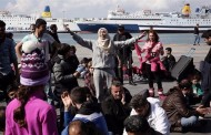 greece isolated as stranded refugees seek passage