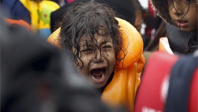 23942659_2015_12_10T080507Z_1690583625_GF20000080758_RTRMADP_3_MIGRANTS_YEAR_ENDER_2015.limghandler