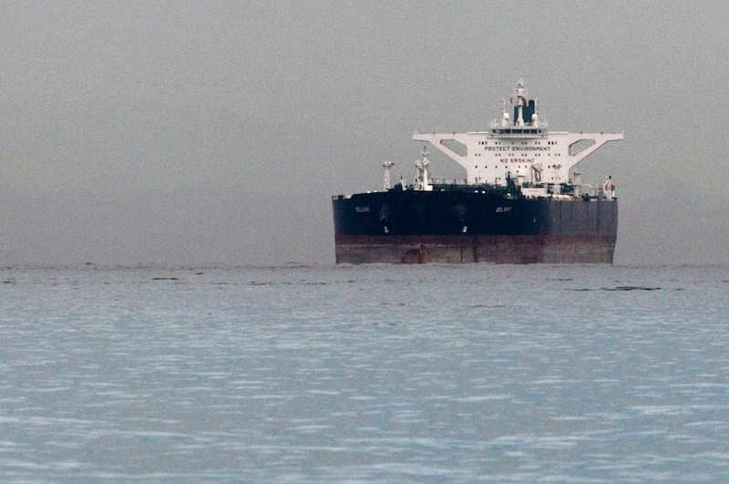 Malta-flagged Iranian crude oil supertanker "Delvar" is seen anchored off Singapore in this March 1, 2012 file photo. The United States expects countries that buy oil from Iran to further reduce their purchases if they want to avoid U.S. sanctions, a State Department source said on December 5, 2012. REUTERS/Tim Chong (SINGAPORE - Tags: BUSINESS POLITICS ENERGY MARITIME)