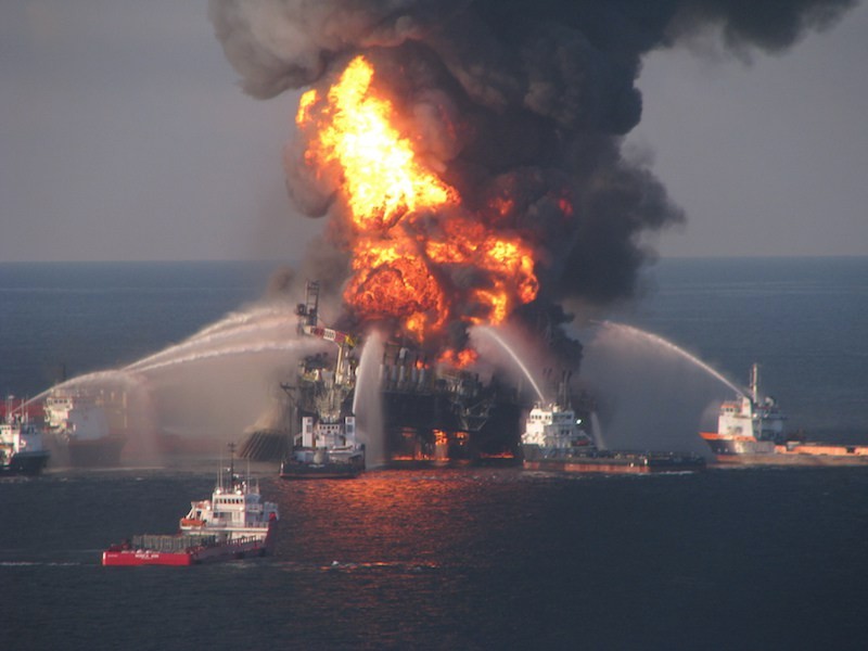 Fire boat response crews battle the blazing remnants of the off shore oil rig Deepwater Horizon April 21. A Coast Guard MH-65C dolphin rescue helicopter and crew document the fire aboard the mobile offshore drilling unit Deepwater Horizon, while searching for survivors April 21. Multiple Coast Guard helicopters, planes and cutters responded to rescue the Deepwater Horizon's 126 person crew.